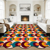 Multicolor circle-pattern scalloped area rug in a living room with fireplace and white sofas