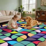 Child and a golden dog on a 9x12 ft colorful scalloped area rug in a living room