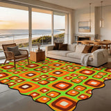 Orange and green square-pattern scalloped area rug 9x12 ft in a living room with beach view windows