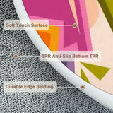 Close-up of round rug edge in pink and olive with anti-slip backing and edge binding