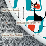 Close-up of round rug edge with a black cat motif, anti-slip backing and edge binding