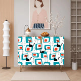 Retro wooden cabinet with black cats on turquoise squares and metal hairpin legs