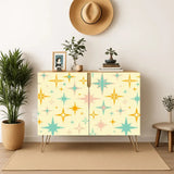 Retro wooden cabinet with gold and teal starbursts on cream and metal hairpin legs