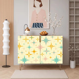 Retro wooden cabinet with gold and teal starbursts on cream and metal hairpin legs