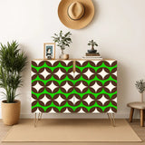 Retro wooden cabinet with brown circles and cream stars on bright green and metal hairpin legs