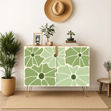 Retro wooden cabinet with sage green flowers on cream and metal hairpin legs