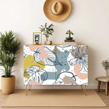 Retro wooden cabinet with pastel line-art flowers on white and metal hairpin legs