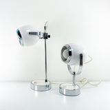 Pair of 1970s chromed WHITE oval EYE-BALL table lamps, one lamp height adjustable